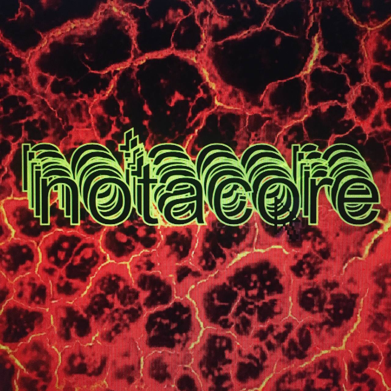Grafik reading notacore on a black and red background