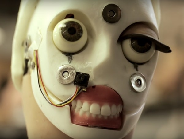 Photo of mechanical doll head with big eyes
